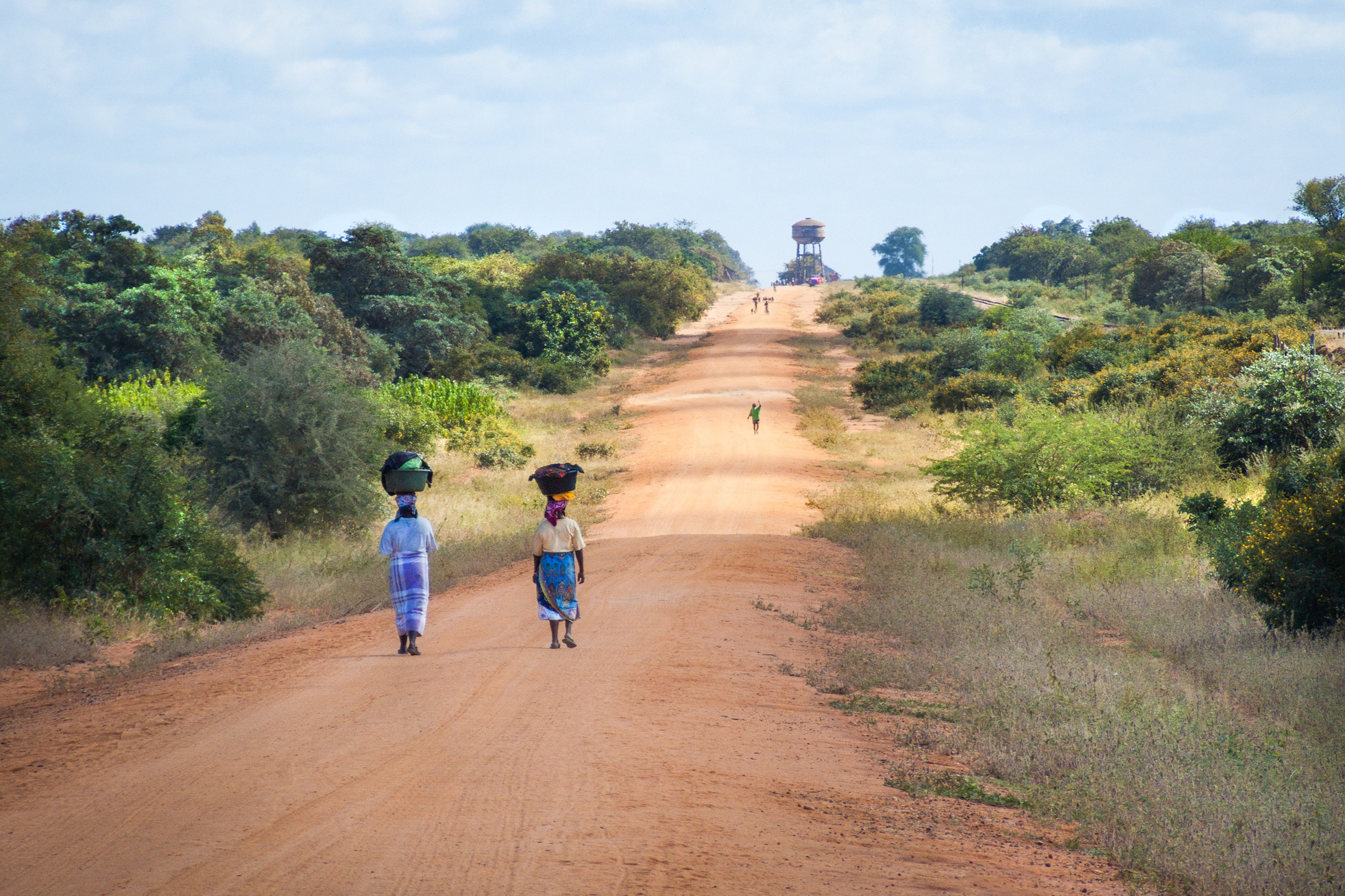 Women Walking Along Road